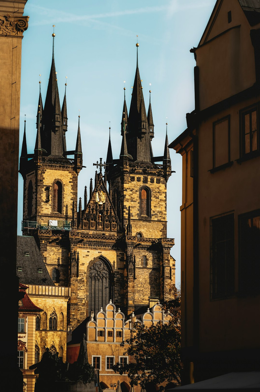 Gothic cathedral spires rising above a European old town